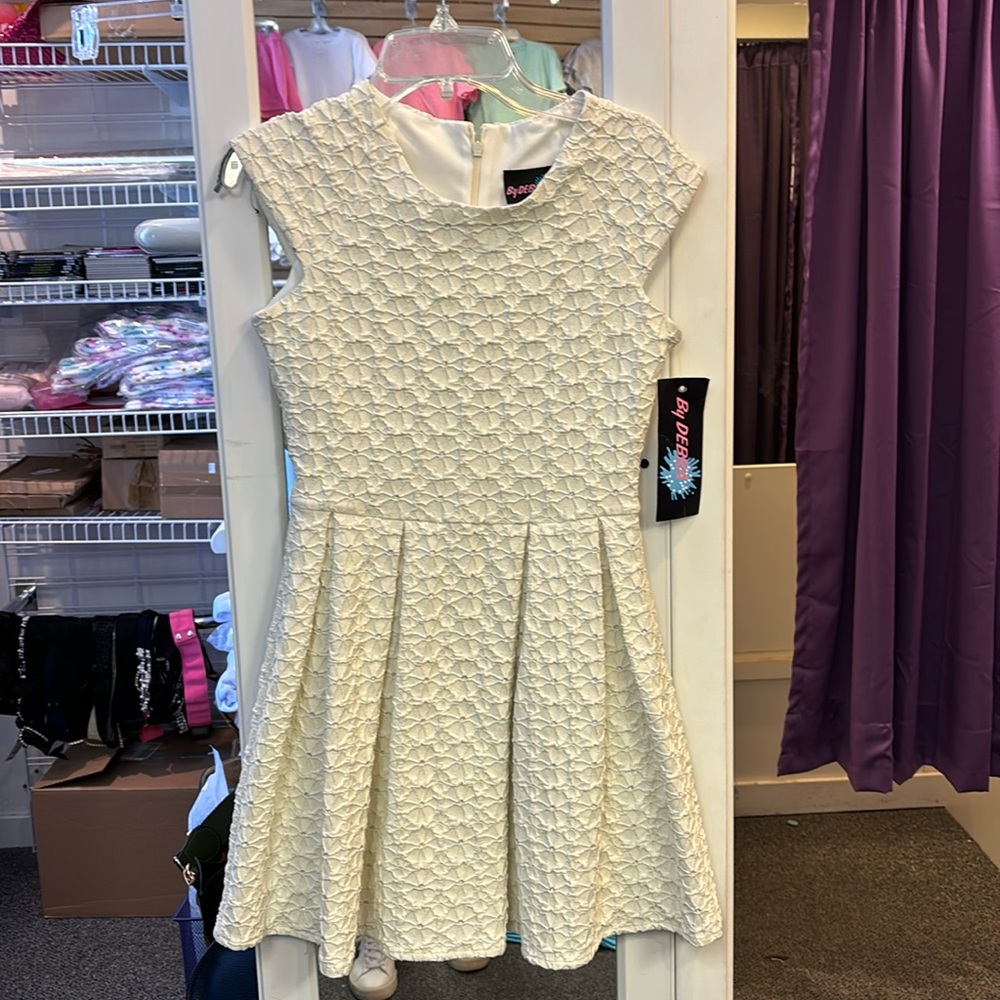 New By Debra dress. Size 12/14.  Cream dress with silver detail